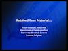 Retained Lens Material